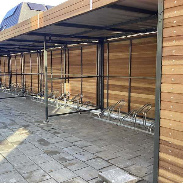 Week 5: FalcoLok overkapping met verfijnde houten details voor een extra stijlvolle uitstraling Week 5: FalcoLok overkapping met verfijnde houten details voor een extra stijlvolle uitstraling