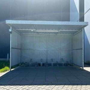 Projecten | Multifunctionele overkappingen bekleed met gepoedercoate perfoplaat | image #1 | 109715 fietsoverkapping overkapping straatmeubilair buitenbank