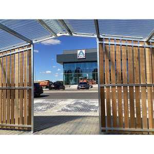 Projecten | Verschillende overkappingen en straatmeubilair bij Aldi distributiecentrum | image #1 | 113031 fietsoverkappingen overkapping fietsparkeren peukenpaal afvalbak straatmeubilair