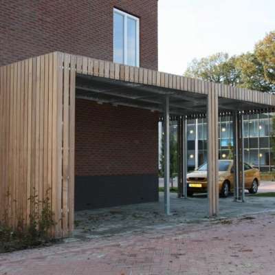 Asymmetrische fietsenstalling met doorlopende overkapping