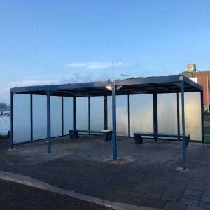 Projecten | Droog zitten in de gemeente Zaanstad | image #1 | 108423 overkapping banken transparante overkapping straatmeubilair