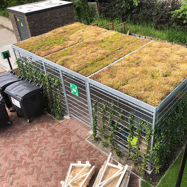 124111 124108 fietsparkeren fietsoverkapping fietsenrek straatmeubilair afvalbak plantenbak  buitenbank